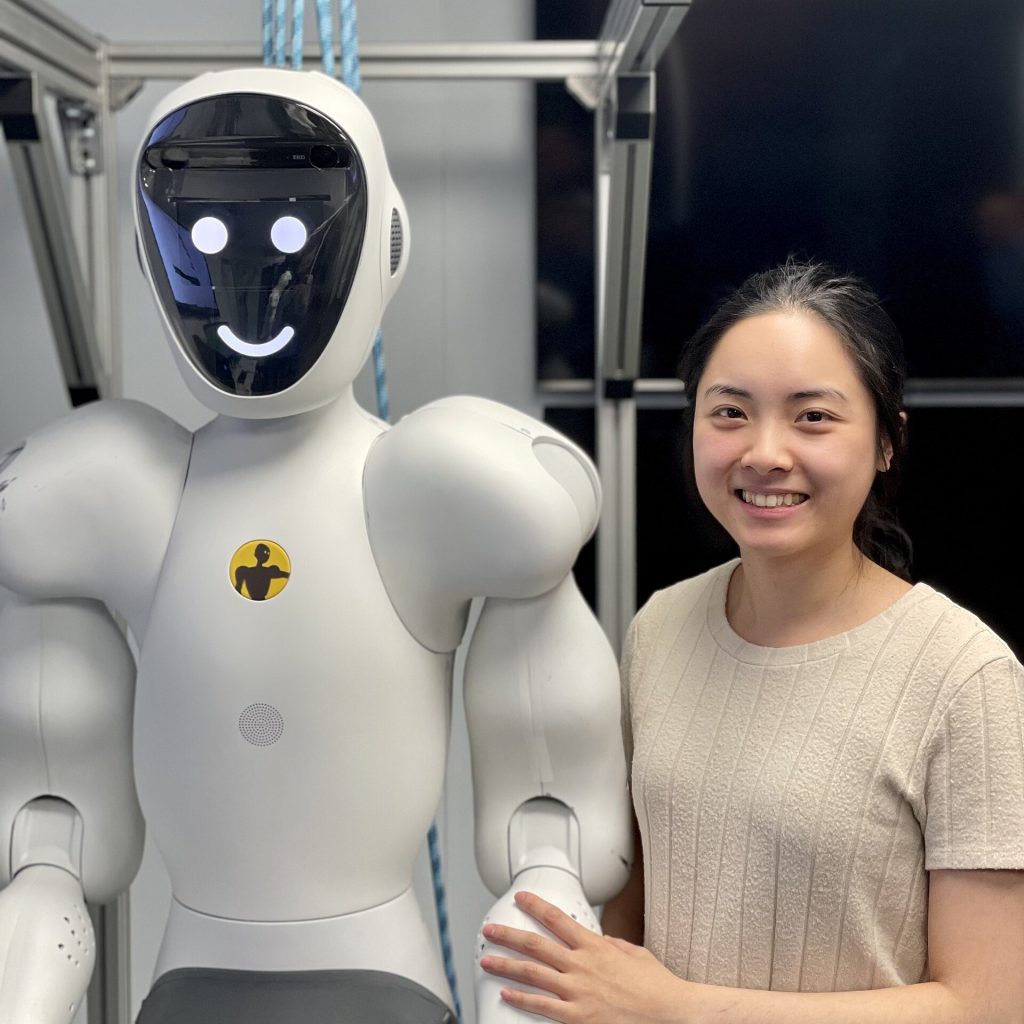 Person holding a smartphone while using an AI assistant application